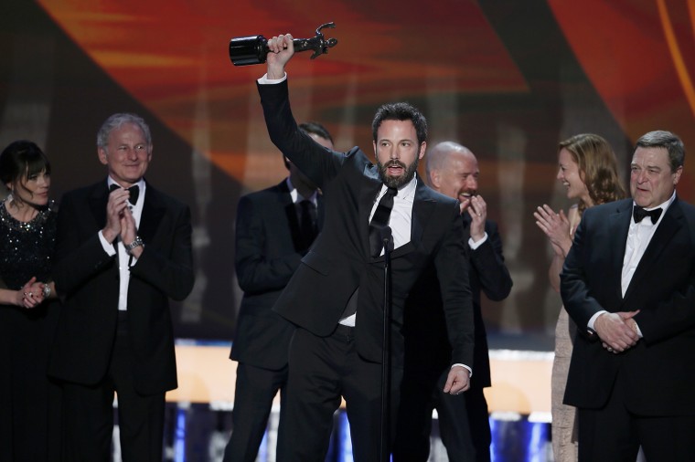 Image: Ben Affleck accepts the award for outstanding cast in a motion picture for \"Argo\" at the 19th annual Screen Actors Guild Awards in Los Angeles
